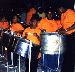 photo of children playing drums